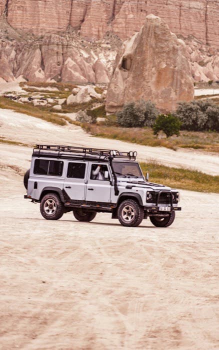 Off-road vehicle in a desert canyon