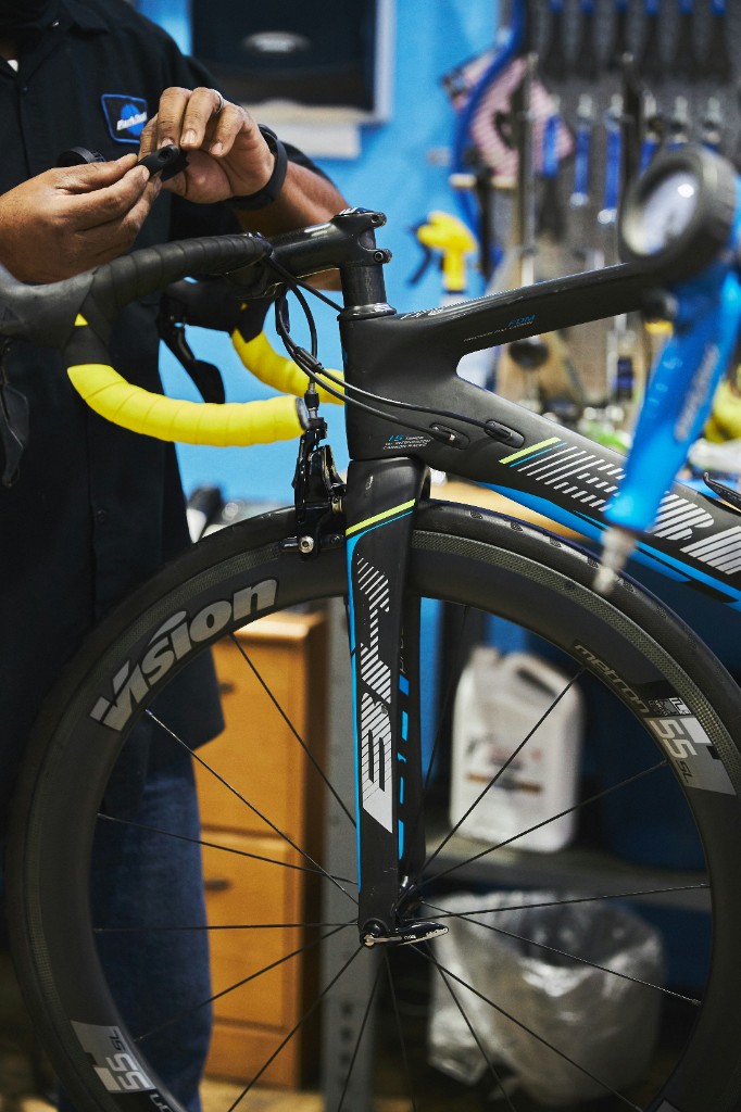 Road bike being serviced in a workshop