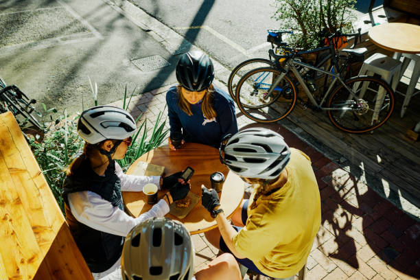 Cyclists taking a coffee break at an outdoor café